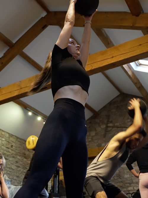 Woman lifting weights during a workout