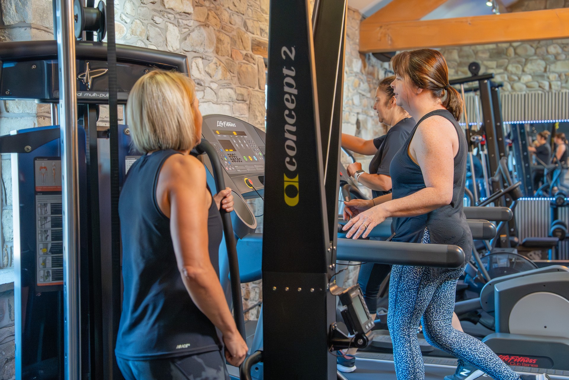 Members chatting on the treadmills
